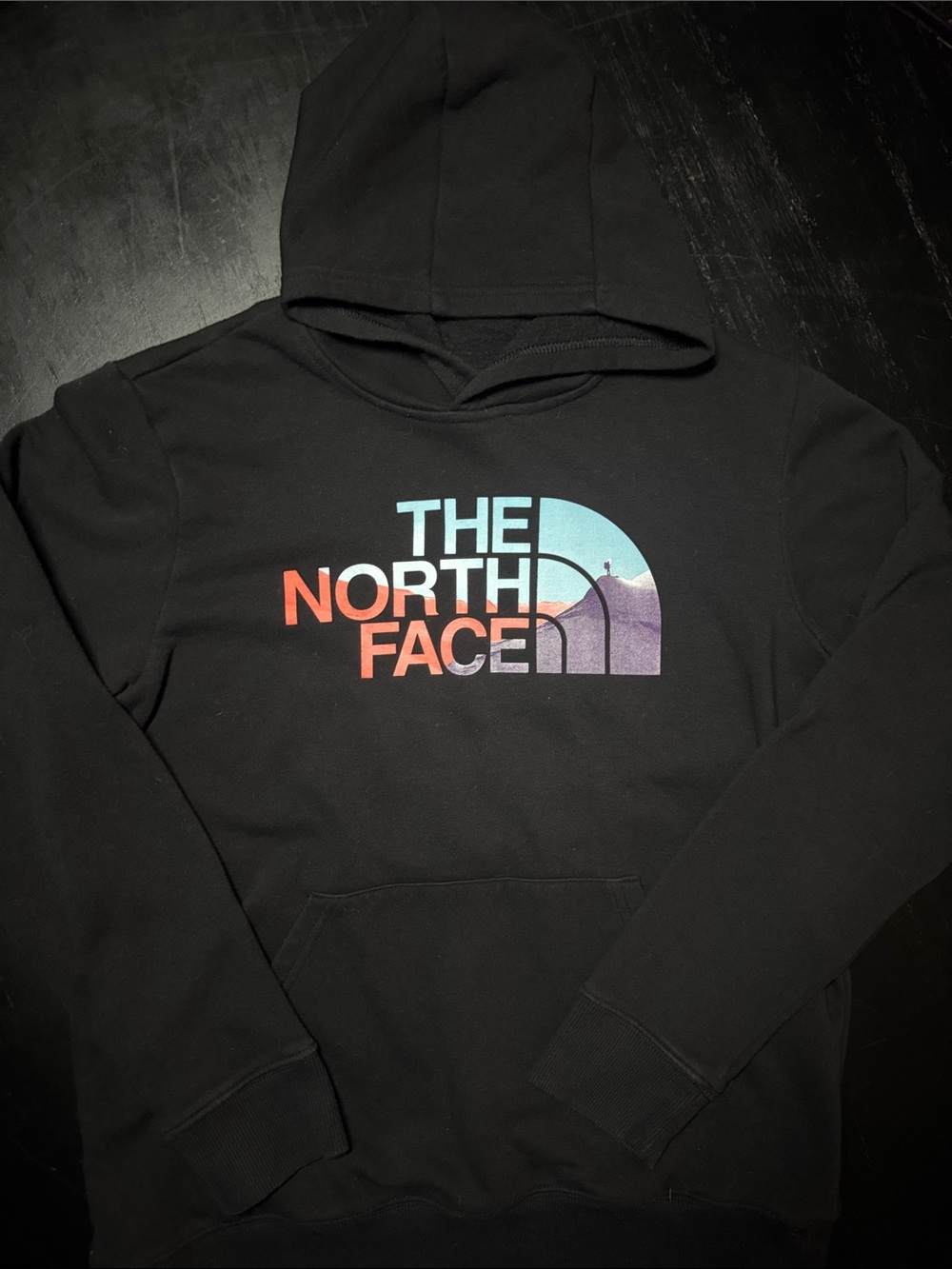 The North Face Black Hoodie with Sunset Gradient Logo